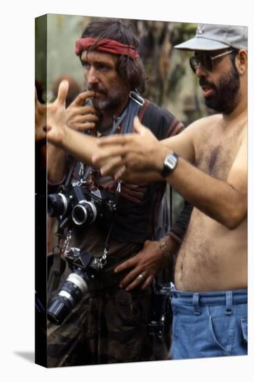 APOCALYPSE NOW, 1979 directed by FRANCIS FORD COPPOLA On the set, Francis Ford Coppola directs Denn-null-Stretched Canvas