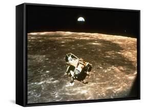 Apollo 11's Lunar Module Flying over the Moon with Earth in the Bkgrd-null-Framed Stretched Canvas