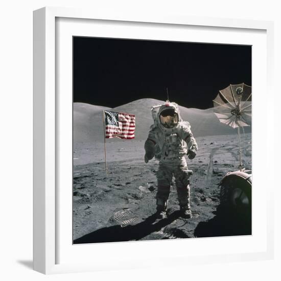 Apollo 17 Astronaut Stands Between US Flag and Lunar Rover, Dec 12, 1971-null-Framed Photo