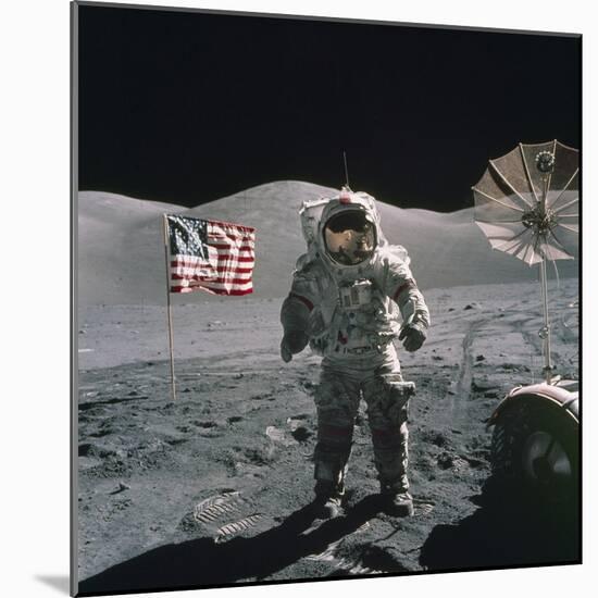 Apollo 17 Astronaut Stands Between US Flag and Lunar Rover, Dec 12, 1971-null-Mounted Photo