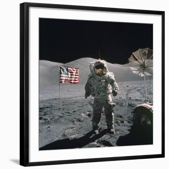 Apollo 17 Astronaut Stands Between US Flag and Lunar Rover, Dec 12, 1971-null-Framed Photo