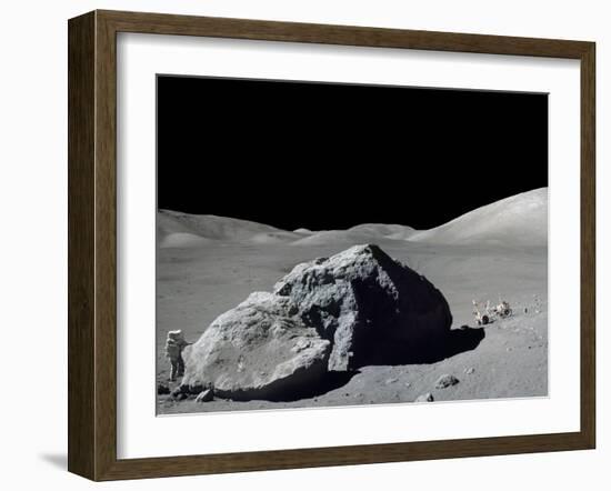 Apollo 17 Geologist-Astronaut Harrison Schmitt Standing Next to a Huge, Split Lunar Boulder-null-Framed Photo