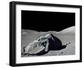 Apollo 17 Geologist-Astronaut Harrison Schmitt Standing Next to a Huge, Split Lunar Boulder-null-Framed Photo