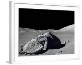 Apollo 17 Geologist-Astronaut Harrison Schmitt Standing Next to a Huge, Split Lunar Boulder-null-Framed Photo