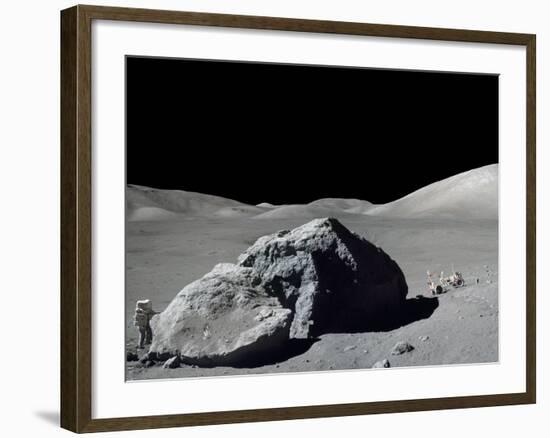 Apollo 17 Geologist-Astronaut Harrison Schmitt Standing Next to a Huge, Split Lunar Boulder-null-Framed Photo