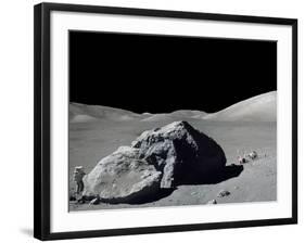 Apollo 17 Geologist-Astronaut Harrison Schmitt Standing Next to a Huge, Split Lunar Boulder-null-Framed Photo