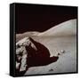 Apollo 17's Rover, a Lunar Vehicle, on the Surface of the Moon Next to Giant Rock-null-Framed Stretched Canvas