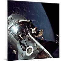 Apollo 9 Astronaut Dave Scott Stands in Open Hatch of Command Module-null-Mounted Photo