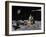 Apollo on Surface of Moon, with Saturn V Rocket in the Background-null-Framed Art Print