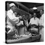 Apprentice Butcher Showing His Work to Competition Judges, Barnsley, South Yorkshire, 1963-Michael Walters-Stretched Canvas