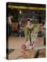 Apprentice Geisha Bowling-Larry Burrows-Stretched Canvas