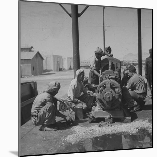 Arabians Working in the Oil Co.'s Garage-Bob Landry-Mounted Photographic Print