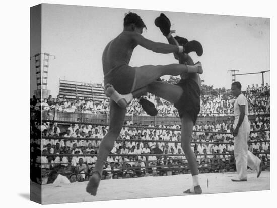 Arann Reongchai and Prasong Chaimeeboon Beginning a Match of a Muay Thai Boxinig-Jack Birns-Stretched Canvas