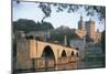Arch Bridge over a River with a Palace in the Background-null-Mounted Photographic Print