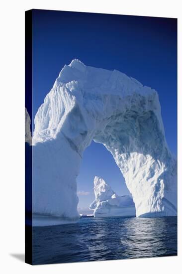 Arch Iceberg Near Lemaire Channel in Antarctica-null-Stretched Canvas