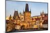 Arch of Lesser Town Bridge Tower on Charles Bridge with St. Nicholas Church in Prague.-Chuck Haney-Mounted Photographic Print