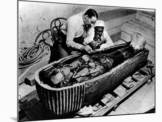 Archaeologist Howard Carter Examining Coffin of Tutankhamen, with 14th Century Egyptian Pharaoh-null-Mounted Premium Photographic Print