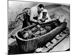 Archaeologist Howard Carter Examining Coffin of Tutankhamen, with 14th Century Egyptian Pharaoh-null-Mounted Premium Photographic Print