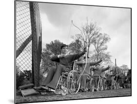 Archery Practice at the Ciswo Paraplegic Centre, Pontefract, West Yorkshire, 1960-Michael Walters-Mounted Photographic Print