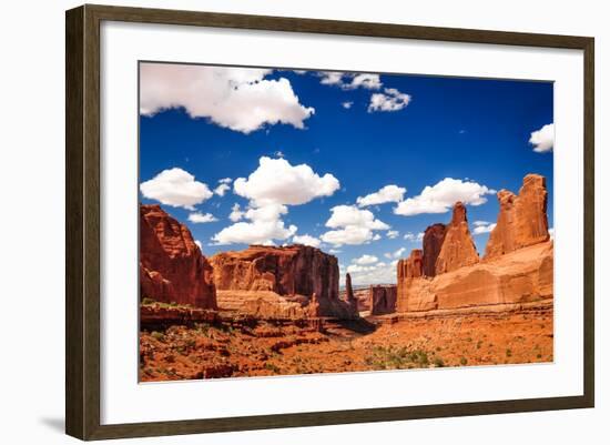 Arches National Park Landscape View with Blue Sky and White Clou-MartinM303-Framed Photographic Print