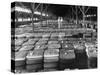 Archie Underwood and Another Man Standing on Top of Great Bales of Cotton in One of His Warehouses-Alfred Eisenstaedt-Stretched Canvas