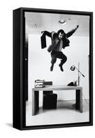 Architect and Designer Frank Gehry Jumping on a Desk in His Line of Cardboard Furniture-Ralph Morse-Framed Stretched Canvas