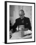 Architect Le Corbusier Studying Architectural Plans and Small Model of Building in His Office-Nina Leen-Framed Premium Photographic Print