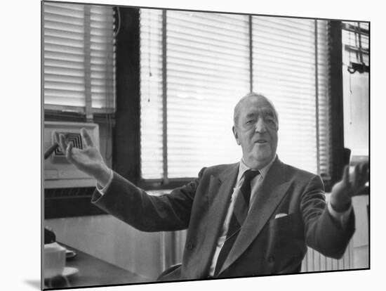 Architect Mies Van Der Rohe Expressing Feelings at His Desk-null-Mounted Premium Photographic Print
