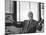 Architect Mies Van Der Rohe Expressing Feelings at His Desk-null-Mounted Premium Photographic Print