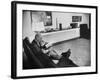 Architect Mies Van Der Rohe Relaxing on Couch While Smoking Cigar and Reading at Home-null-Framed Premium Photographic Print