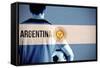 Argentina Football Player Holding Ball against Argentina National Flag-Wavebreak Media Ltd-Framed Stretched Canvas