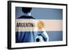 Argentina Football Player Holding Ball against Argentina National Flag-Wavebreak Media Ltd-Framed Photographic Print