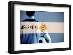 Argentina Football Player Holding Ball against Argentina National Flag-Wavebreak Media Ltd-Framed Photographic Print