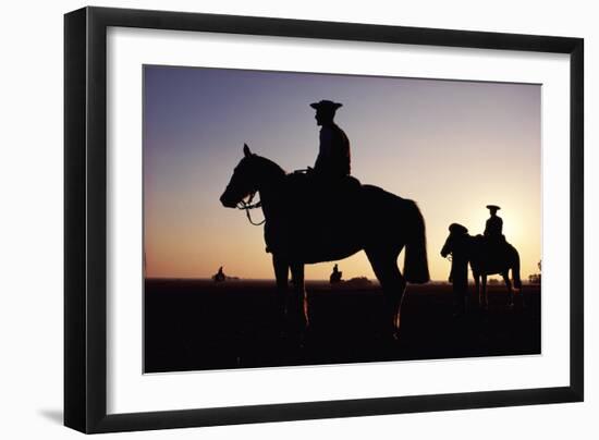 Argentina, Horsemen in Landscape, Silhouette, Sunset-Christopher Pillitz-Framed Photographic Print