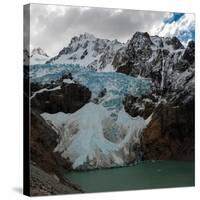 Argentina, Piedras Blancas Glacier pours off Fitzroy and terminates in Lago de los Tres-Howie Garber-Stretched Canvas