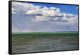 Argentina, Santa Cruz. Puerto Santa Cruz, river Santa Cruz under stormy clouds.-Michele Molinari-Framed Stretched Canvas