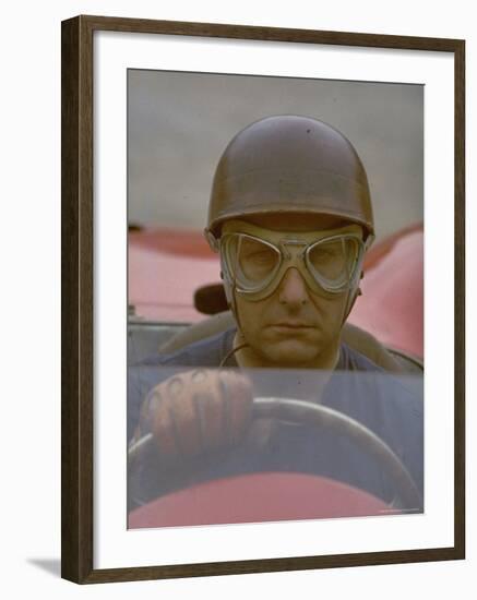 Argentine Auto Racer Juan Manuel Fangio Sitting at Wheel of Race Car at Las Mans-Howard Sochurek-Framed Premium Photographic Print