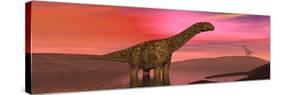 Argentinosaurus Dinosaurs Amongst a Colorful Red Sunset-null-Stretched Canvas