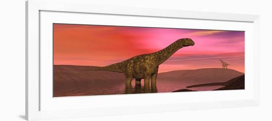 Argentinosaurus Dinosaurs Amongst a Colorful Red Sunset-null-Framed Art Print