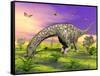 Argentinosaurus Eating Plants While Surrounded by Butterflies and Flowers-null-Framed Stretched Canvas