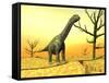 Argentinosaurus Standing on the Cracked Desert Ground Next to Dead Trees-null-Framed Stretched Canvas