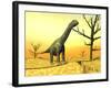 Argentinosaurus Standing on the Cracked Desert Ground Next to Dead Trees-null-Framed Art Print