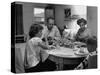 Arizona Family Seated at their Dining Room Table, Enjoying their Dinner-Nina Leen-Stretched Canvas