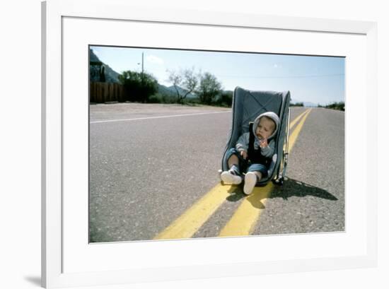 Arizona Junior RAISING ARIZONA by Joel Coen and Ethan Coen, 1987 (photo)-null-Framed Photo