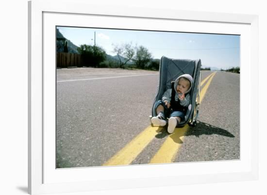 Arizona Junior RAISING ARIZONA by Joel Coen and Ethan Coen, 1987 (photo)-null-Framed Photo