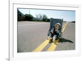 Arizona Junior RAISING ARIZONA by Joel Coen and Ethan Coen, 1987 (photo)-null-Framed Photo