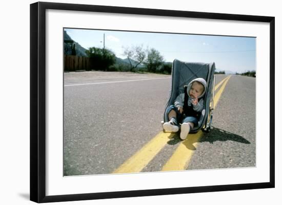 Arizona Junior RAISING ARIZONA by Joel Coen and Ethan Coen, 1987 (photo)-null-Framed Photo