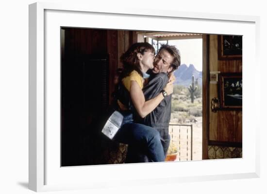 Arizona Junior RAISING ARIZONA by Joel Coen and Ethan Coen with Holly Hunter and Nicolas Cage, 1987-null-Framed Photo