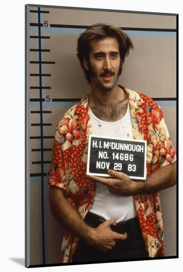 Arizona Junior RAISING ARIZONA by Joel Coen and Ethan Coen with Nicolas Cage, 1987 (photo)-null-Mounted Photo