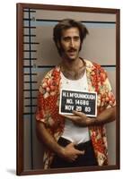 Arizona Junior RAISING ARIZONA by Joel Coen and Ethan Coen with Nicolas Cage, 1987 (photo)-null-Framed Photo